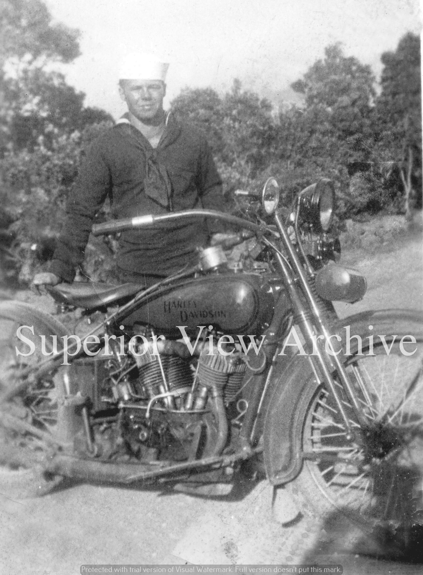 Vintage Sailor on a Harley Davidson Motorcycle