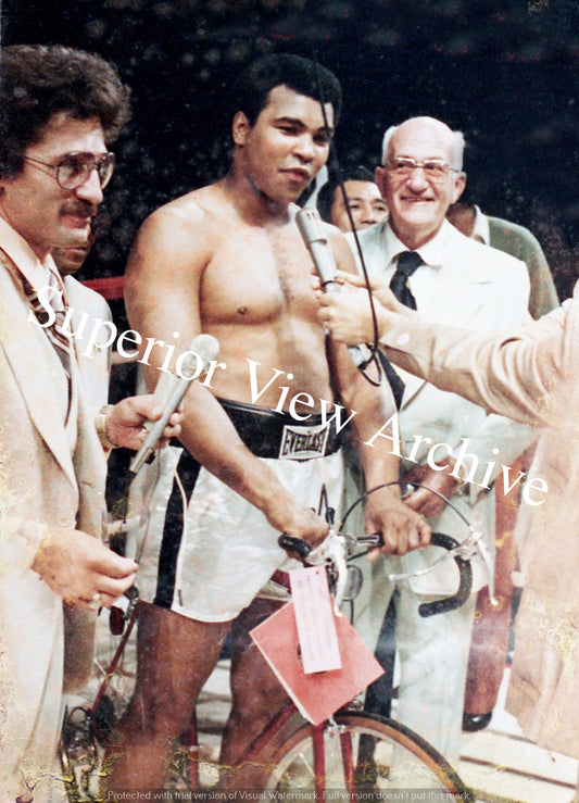 Muhammad Ali Gets Bike
