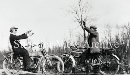 Harley Davidson Motorcycle Rider Holds Up Excelsior Motorcycle Rider With Guns