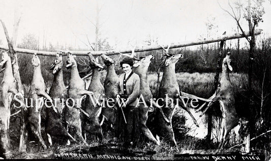 Woman Hunter with her Buck Pole